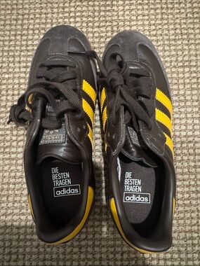 adidas Men’s Black Sneakers with Yellow Three-Stripes